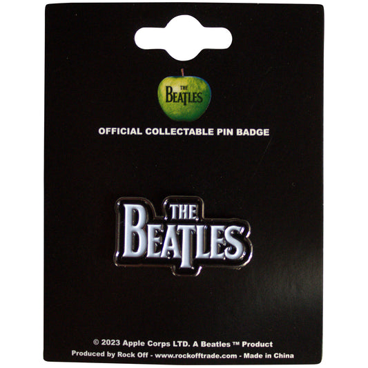 Een foto van een The Beatles Speld Badge