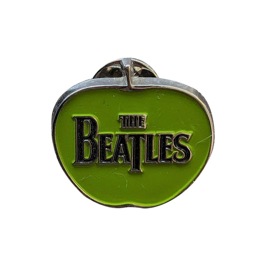 Een foto van een The Beatles Speld